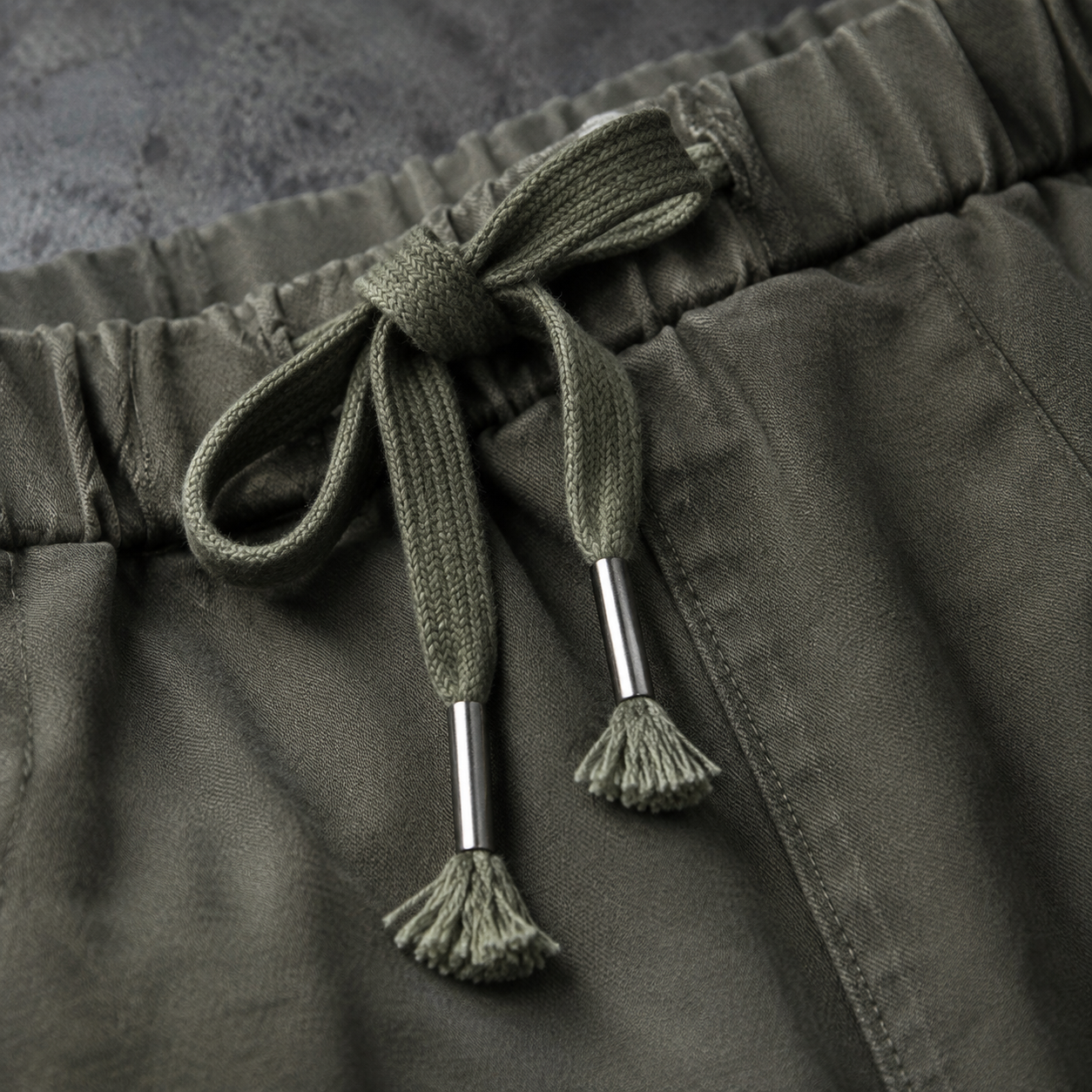 Olive jogger pants elastic drawstring waistband detail