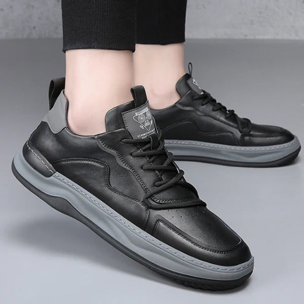Brooks & Beck Marlow Leather Sneakers in Black - Side Profile on Foot